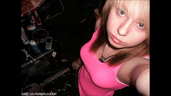 youthful blond teenie making selfshots in her guest room