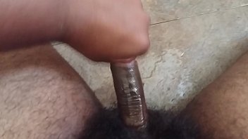Erect circumcised penis masturbation