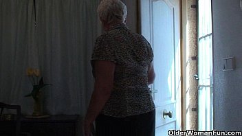 Chubby granny in stockings plays with vibrator