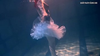 bulava lozhkova with a crimson truss and mini-skirt underwater